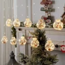 Kép 4/6 - LED fényfüzér gömbök mikulás figurás meleg fehér 3m-3