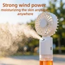 Kép 2/5 - USB tölthető kézi párásító ventilátor – 2 az 1-ben hűtő és permetező ventilátor